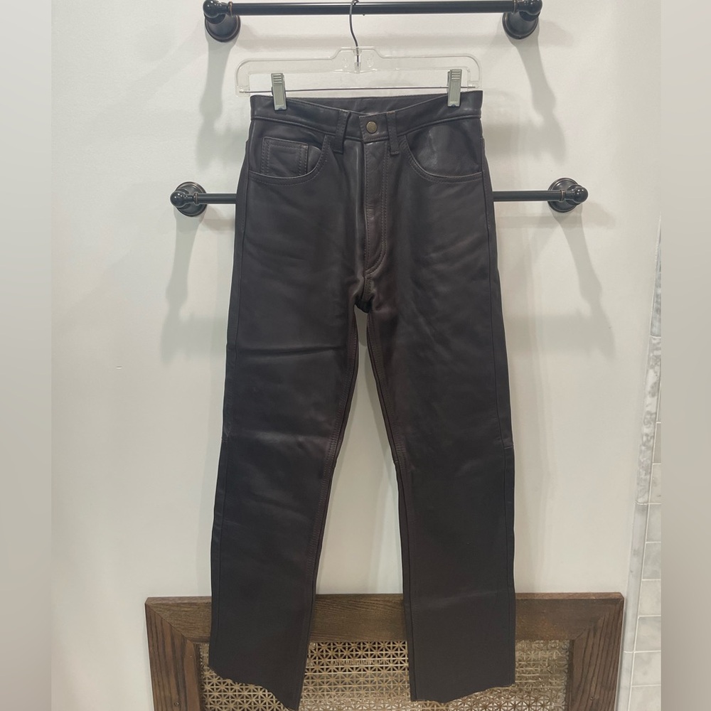 Brown leather pants.